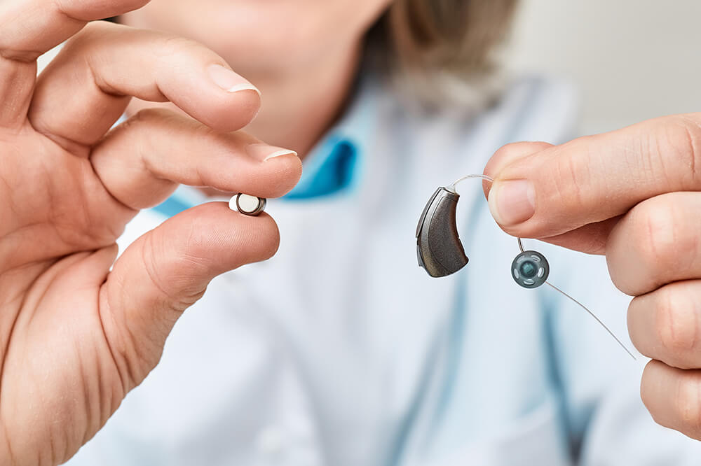 hearing aid batteries and aid
